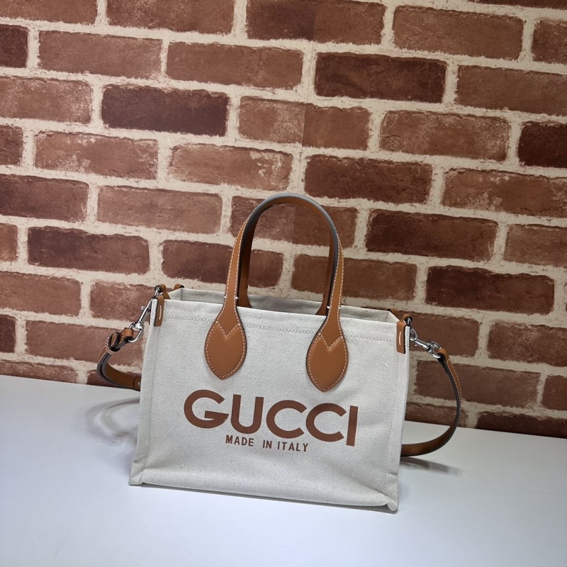 G*u*i shopping bags